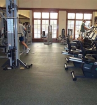 gym equipment sitting on safety surfacing